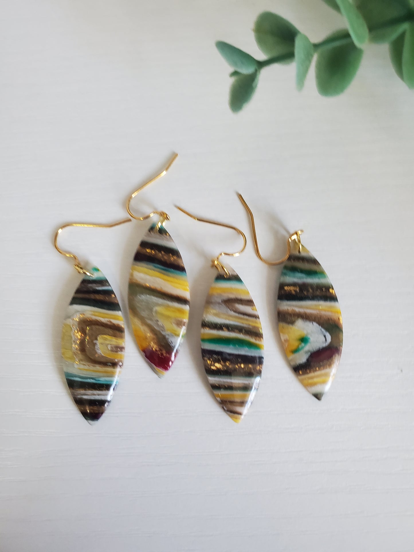Golden "agate" drop